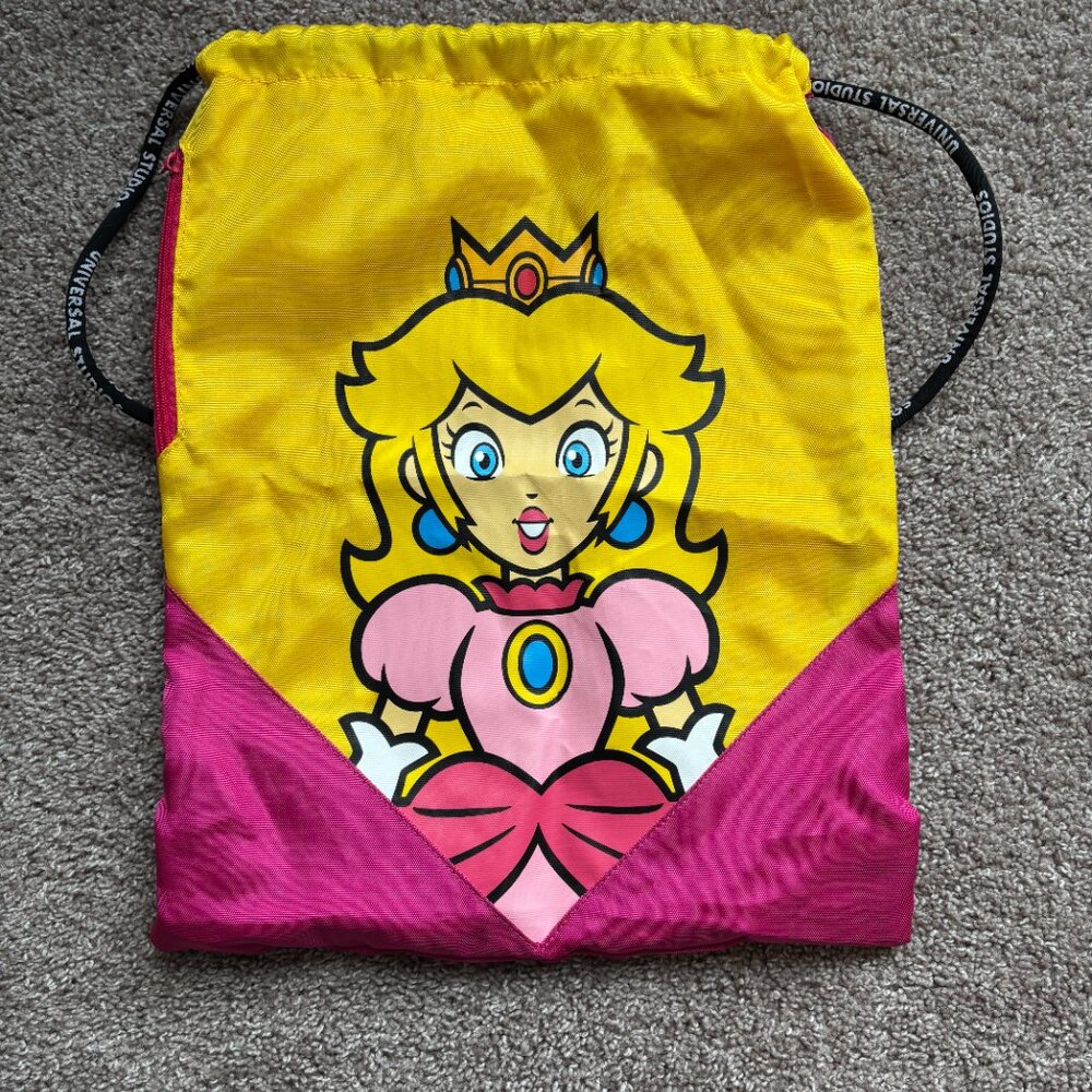 Epic Universe Super Nintendo World Princess Peach Yellow Drawstring Bag